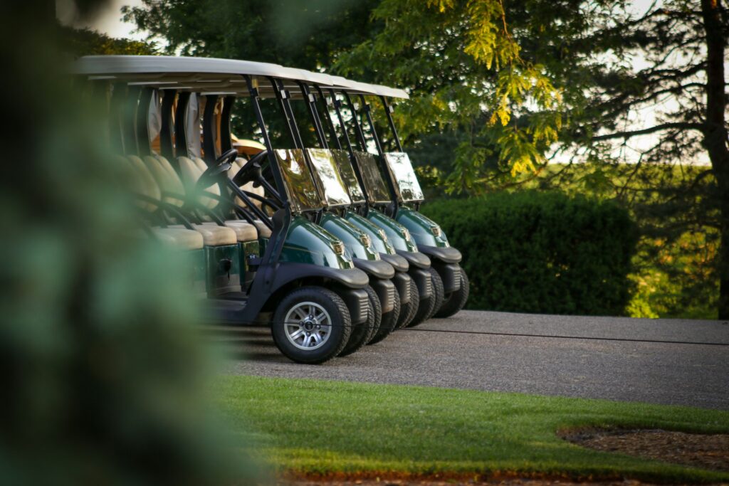A view of golf carts A view of green golf carts